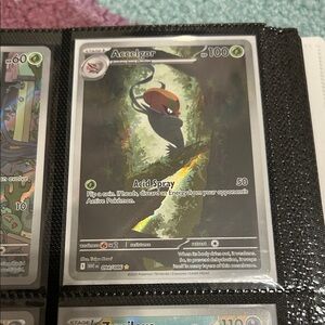 Pokemon Accelgor Card with Red and Green Accents